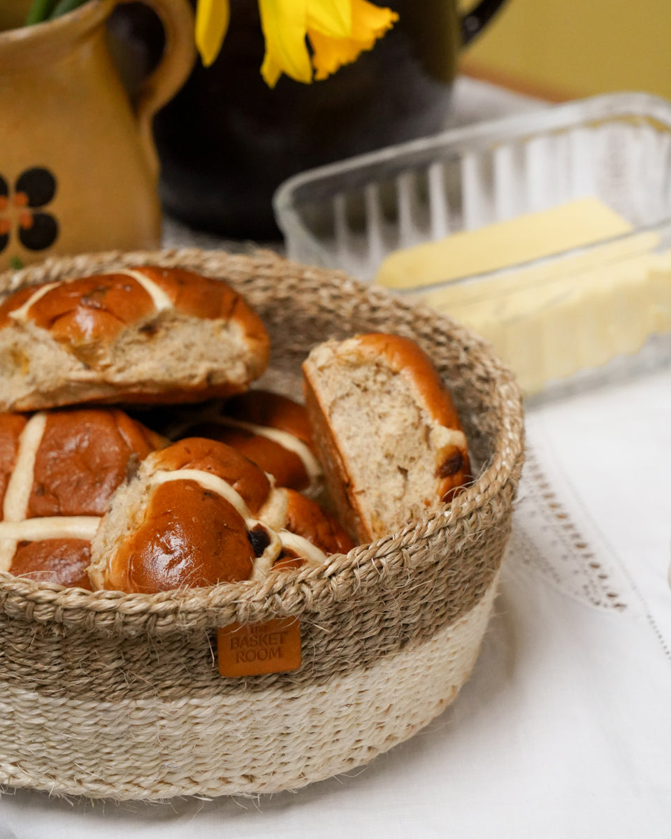 Hot cross buns in a woven basket