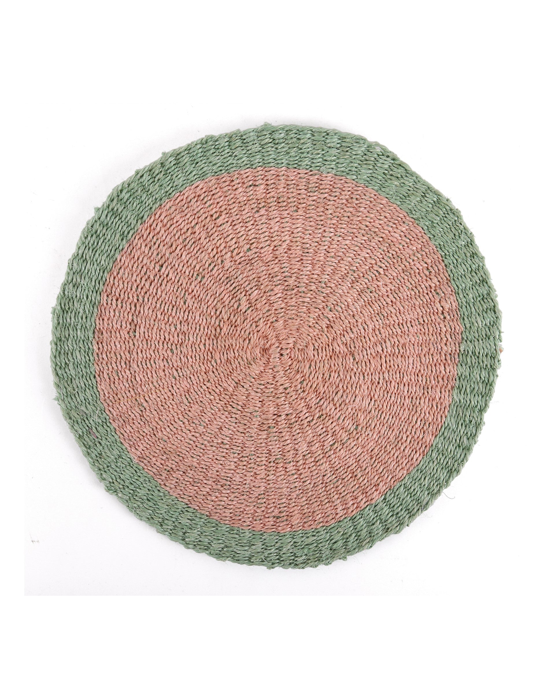 Round woven placemat with pink center and green border on a white background